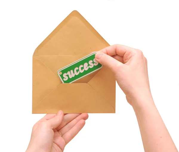 Woman hand holding envelope mail with message of success — Stock Photo, Image