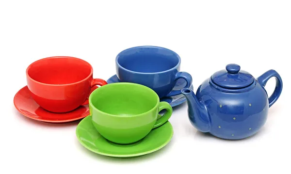 Teekanne, Tasse und Zucker auf weißem Hintergrund — Stockfoto