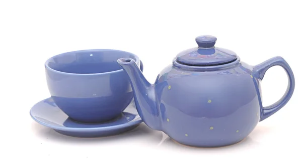 Teekanne, Tasse und Zucker auf weißem Hintergrund — Stockfoto