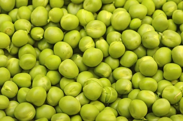 Guisantes verdes fondo alimentos vegetales dieta saludable — Foto de Stock