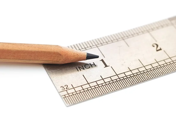 Régua de aço e lápis de madeira no gráfico de papel — Fotografia de Stock