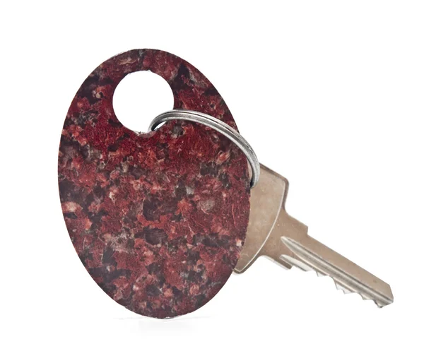 Key with a blank tag on a white background — Stock Photo, Image