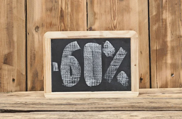 Sixty percent discount written on blackboard — Stock Photo, Image