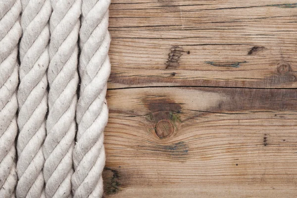 Fundo de madeira com corda — Fotografia de Stock