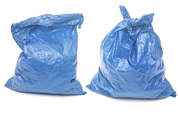 Modré pytle na odpadky izolované na bílém pozadí — Stock fotografie