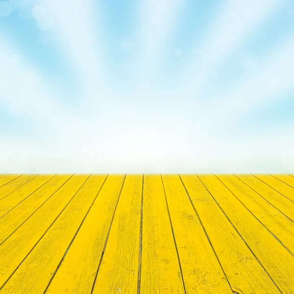 Luce del sole e bokeh verde e pavimento in legno — Foto Stock