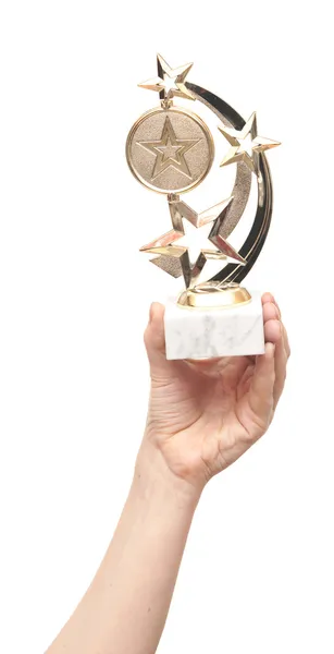 Трофейна чашка в руці ізольована на білому — стокове фото