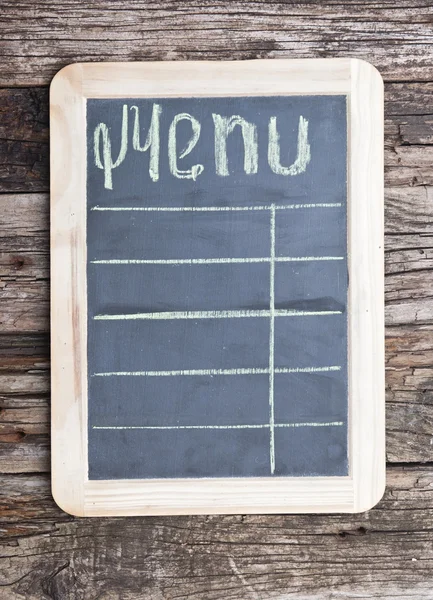 Word "menu" writen on aged blackboard and hanging on wooden wal — Stock Photo, Image