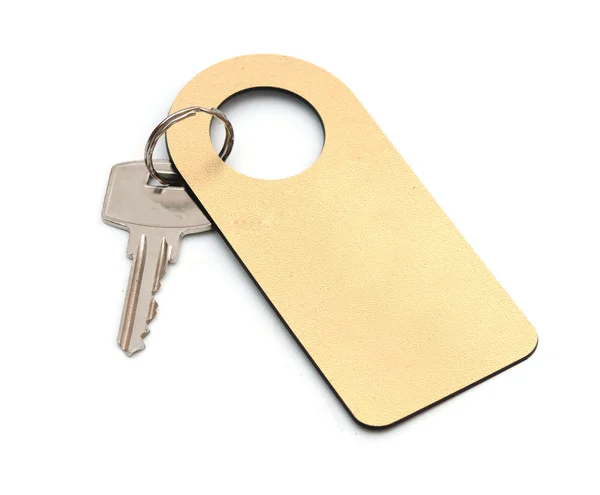Isolated key with a label on a white background — Stock Photo, Image