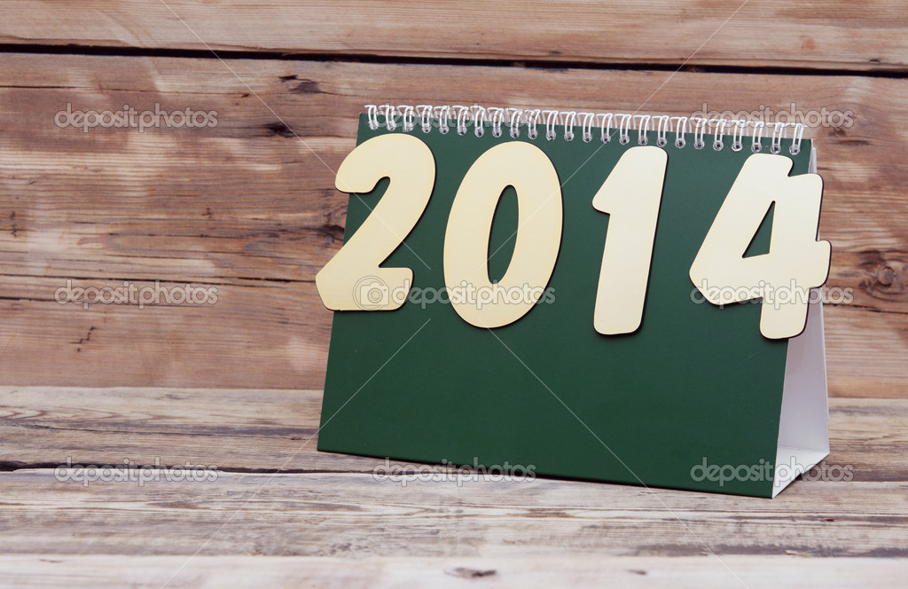 Desk Calendar With Gold Numbers 2017 On Old Wooden Table Stock Desk Calendar With Gold Numbers 2017 On Old Wooden Table Photo By Inxti74