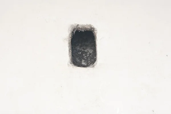 Ventilation shaft exit in a dirty gray worn wall — Stock Photo, Image