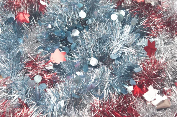 Background from red and blue christmas tinsel — Stock Photo, Image