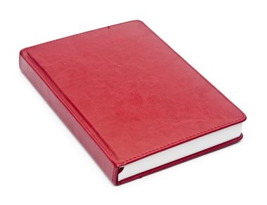 beyaz zemin üzerine kırmızı deri notebook
