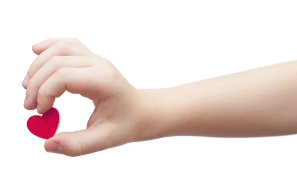 Hands hold a red heart on white background — Stock Photo, Image