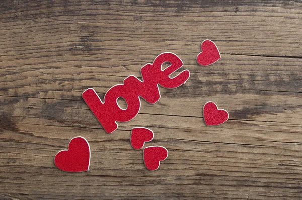 Word ''love'' on a old wood planks. — Stock Photo, Image