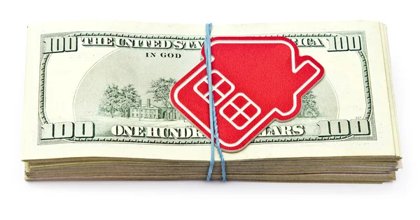 Yüz dolar faturaları kırmızı ev işareti. Emlak iş konsantrasyon — Stock Fotó