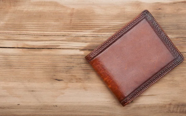 木製の背景に財布 — ストック写真