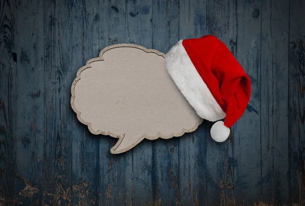 Christmas Hat Hung Cardboard Speech Bubble Vintage Wooden Wall Copy — Stock Photo, Image