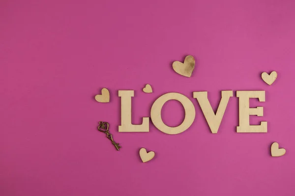Liebeswort Kleine Herzen Auf Rosa Pastellgrund Draufsicht Auf Den Valentinstag — Stockfoto