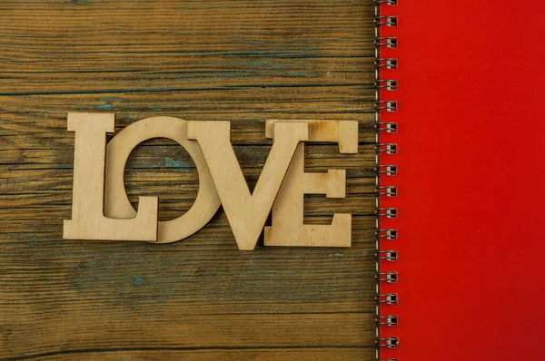 Liebe Wort Kleine Herzen Auf Dold Holz Hintergrund Draufsicht Auf — Stockfoto