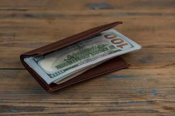 Brown Leather Wallet One Hundred Dollar Bills Wooden Table Ortune — Fotografia de Stock