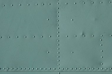 Vintage metal kaplama. Perçin ile beyaz ve mavi boya cilt. kopya alanı. Yumuşak odaklama.