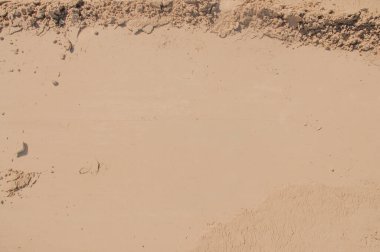 İnce kum dokusunun üst görünümü doğal arkaplan Yaz ve seyahat arkaplanı.