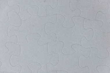 Grey jigsaw puzzle using as background education or business, puzzle day concept.