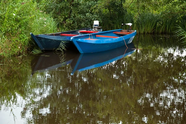 Two Blue Boats on the lake — Stock Photo, Image