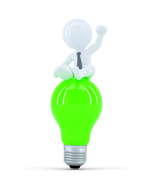 Empresário em cima da lâmpada verde. Conceito de ideia empresarial — Fotografia de Stock