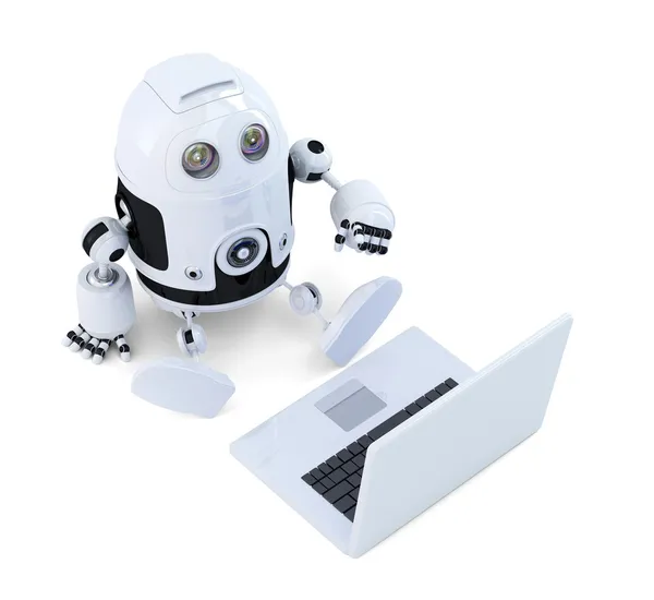 Robot zitten met laptop — Stockfoto