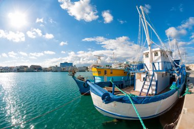 Old fishing boat in Limassol harbour. clipart