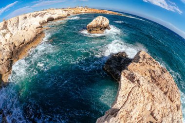 Wide angled shot of rocky coast with caves near Agia Napa, Cyprus.