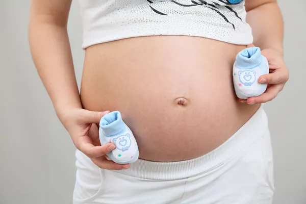 Pregnant woman, stomach