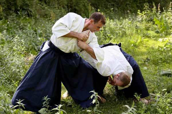 Entrenamiento arte marcial Aikido . Imágenes de stock libres de derechos