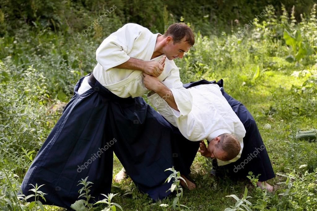 Training martial art Aikido. — Stock Photo © Novoselov 39397357