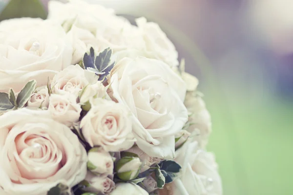 Vintage photo of white wedding bouquet — Stock Photo, Image