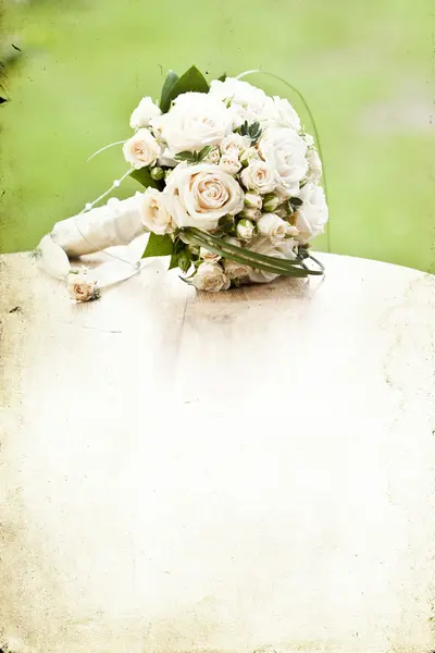 Vintage photo of white wedding bouquet — Stock Photo, Image