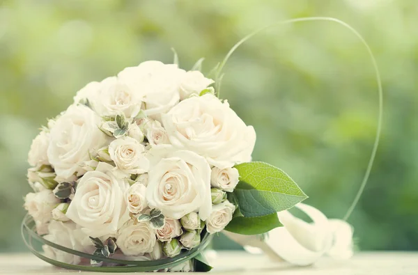 Vintage photo of white wedding bouquet — Stock Photo, Image