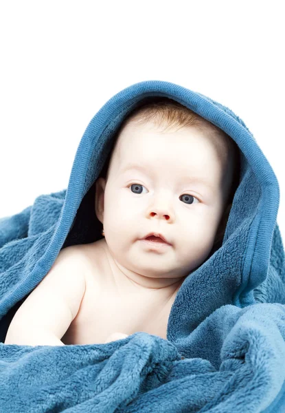 Cute baby hideing in blue blanket — Stock Photo, Image