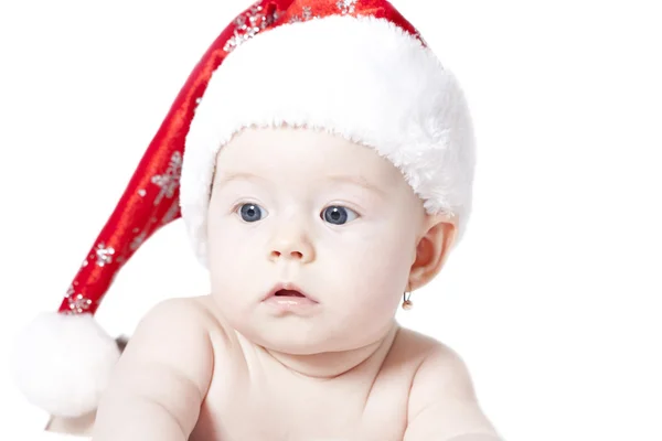 Dziecko z santa kapelusz na białym tle — Zdjęcie stockowe