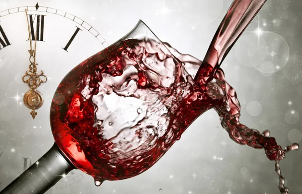 Pouring red wine at midnight — Stock Photo, Image