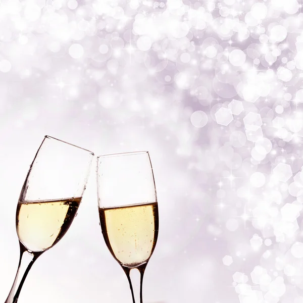 Two glasses of champagne on brillante background — Stock Photo, Image