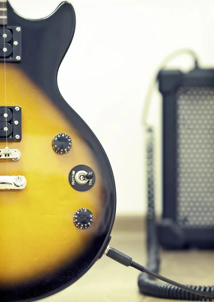 Guitar with amplifier — Stock Photo, Image