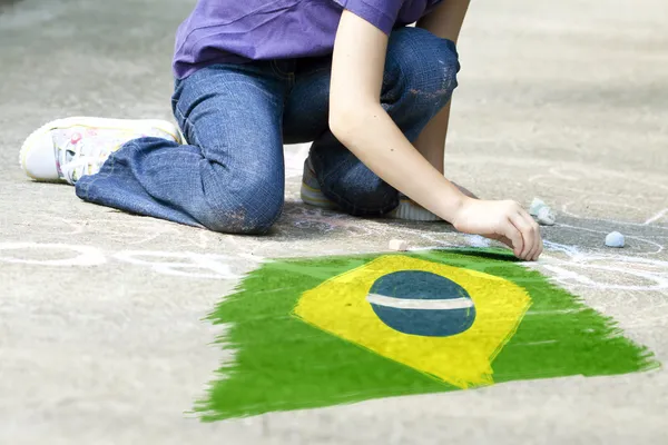 Child drawing Brazil flag Stock Photo