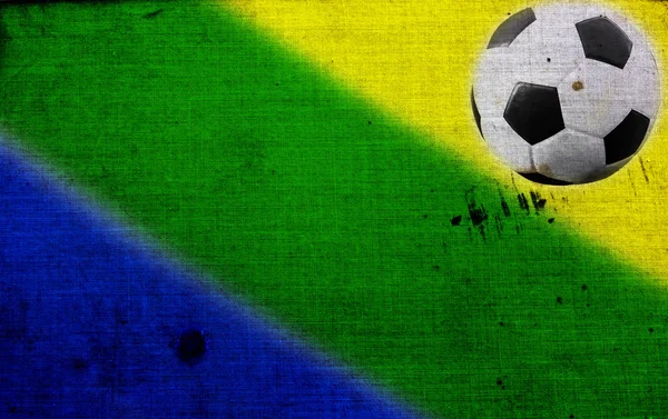 Fotbalový míč a Brazílie vlajka — Stock fotografie