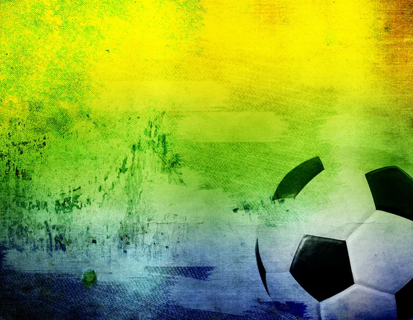 Voetbal en de Brazilië vlag kleuren — Stockfoto