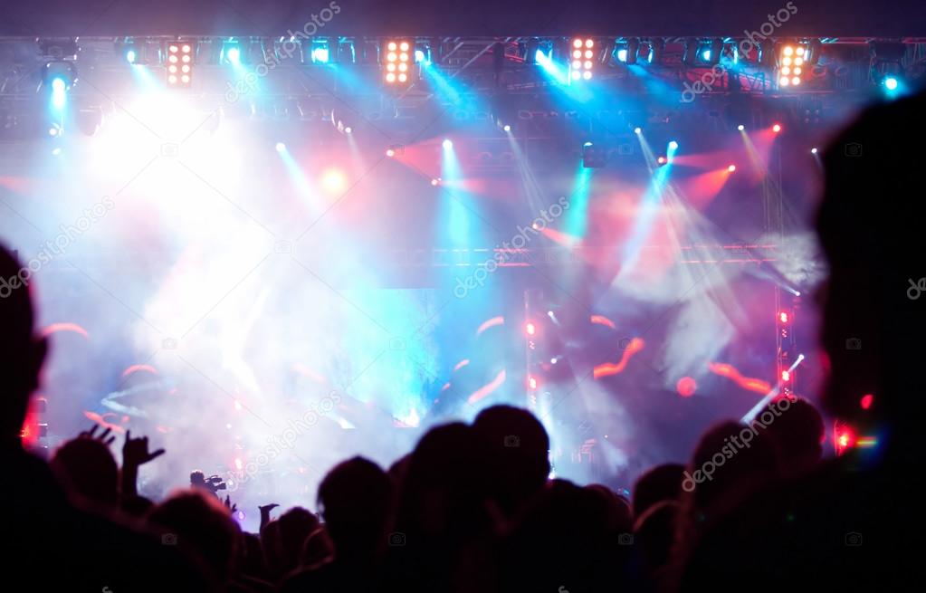Crowd and stage lights at concert