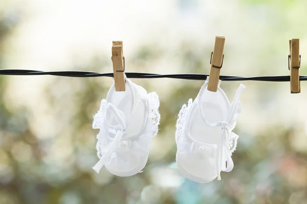 Hanging baby clothes — Stock Photo, Image
