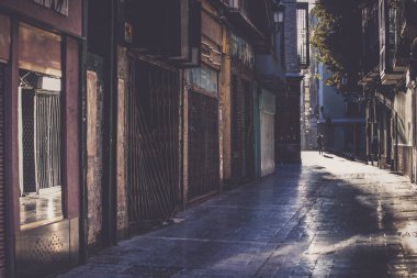 Narrow strees of Zaragoza in sunrise, Spain